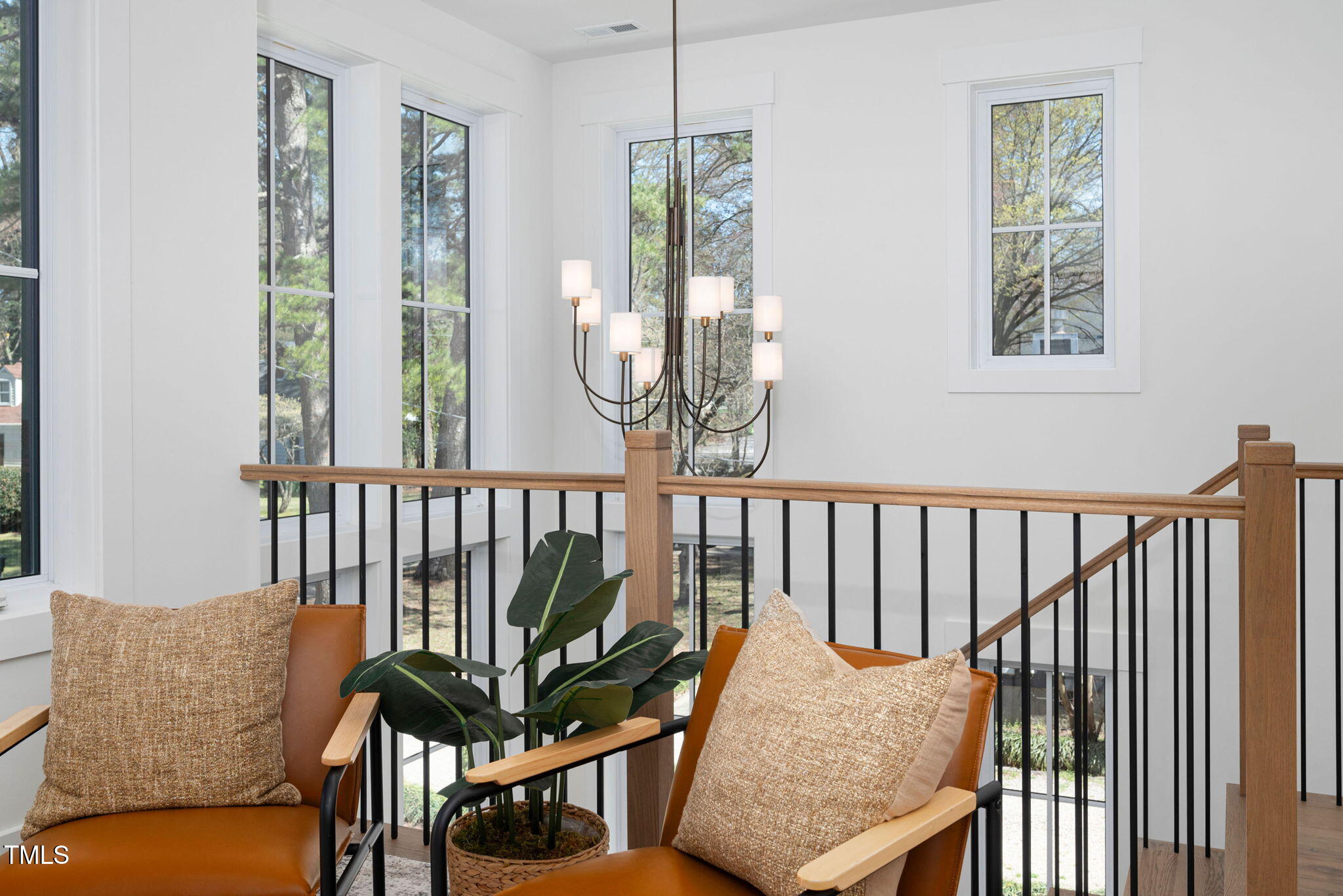 604 Edmund Street Raleigh, NC 27604 - Photo 48 of 70 a view of a balcony with furniture