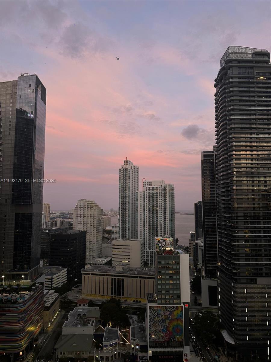 999 Southwest 1st Avenue, Unit 3208 Miami, FL 33130 - Photo 1 of 14 a view of a city with tall buildings