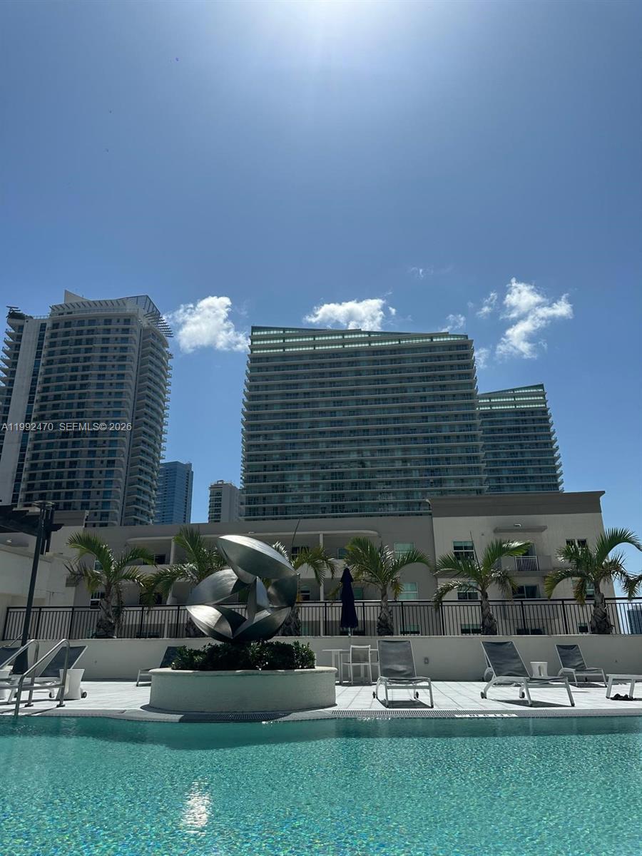 999 Southwest 1st Avenue, Unit 3208 Miami, FL 33130 - Photo 3 of 14 a picture of houses with outdoor space