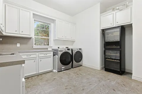 a kitchen with a stove and a sink