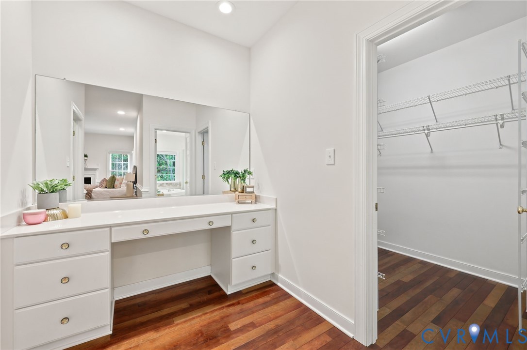 4701 Regal Oaks Road Glen Allen, VA 23059 - Photo 26 of 60 a spacious bathroom with a granite countertop sink and a mirror
