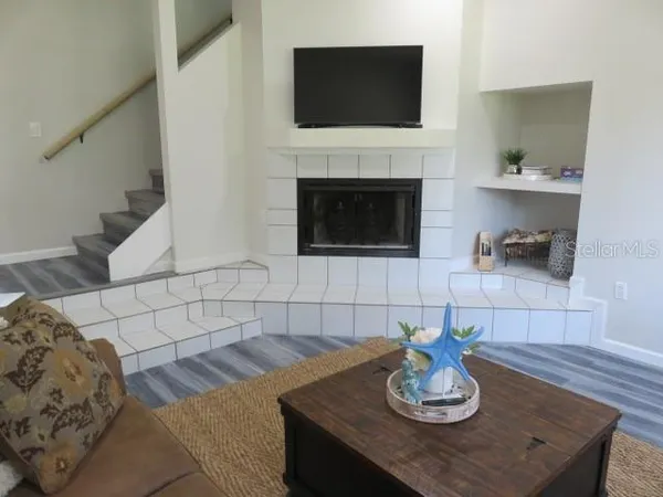 a backyard of a house with yard and outdoor seating