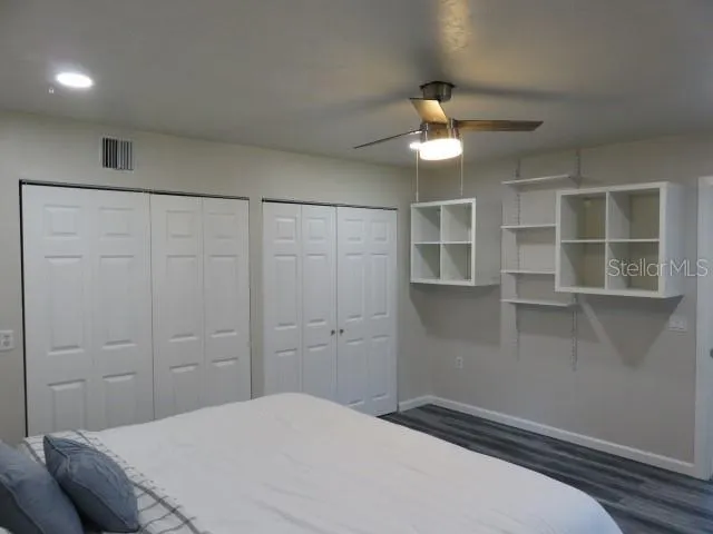 a living room with furniture and windows