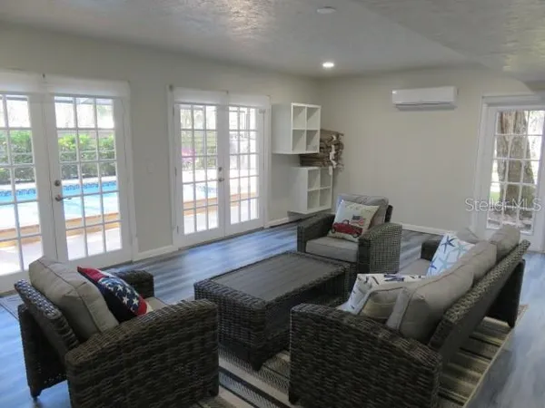 a view of a swimming pool with a patio