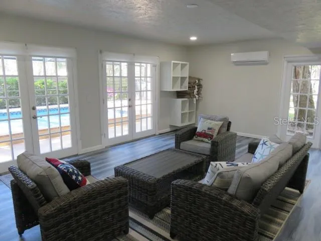 a view of a swimming pool with a patio