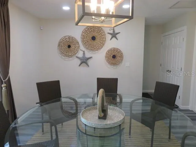 a view of a dining room with furniture window and outside view