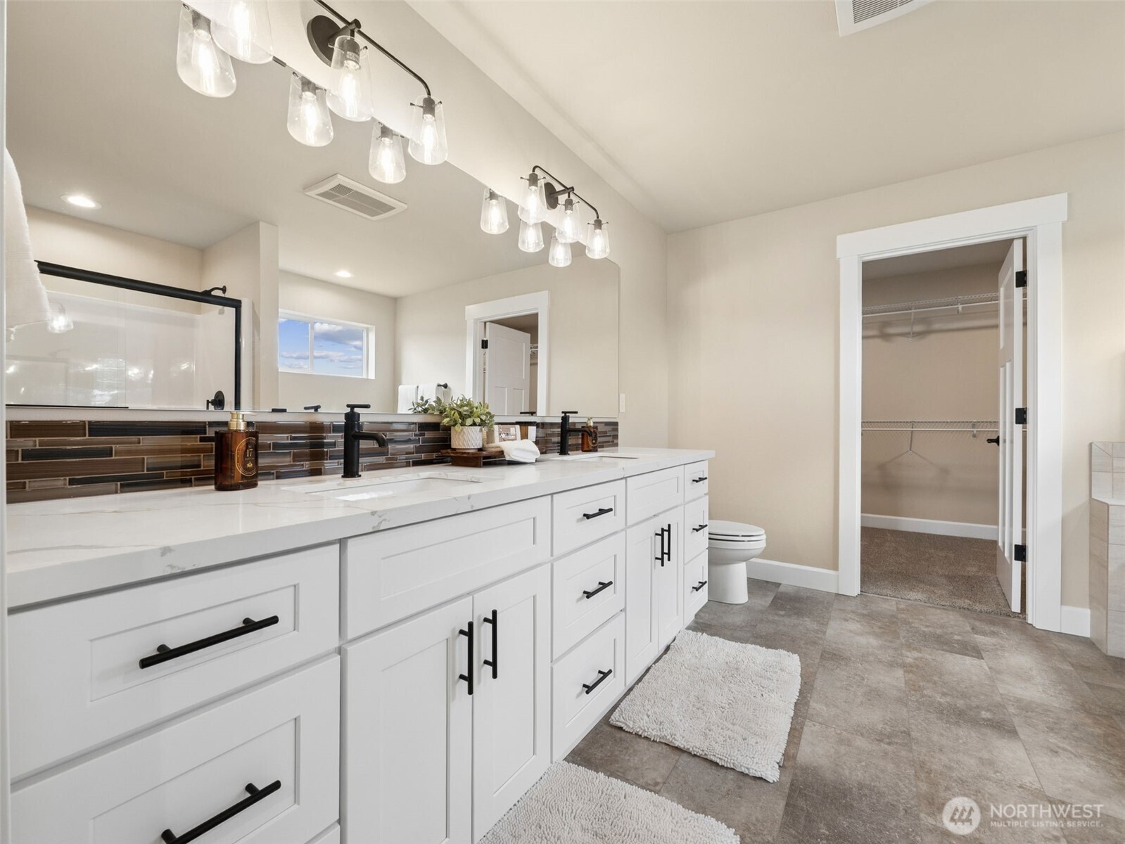 1742 Fieldcrest Place Buckley, WA 98321 - Photo 13 of 27 a bathroom with a double vanity sink and a mirror