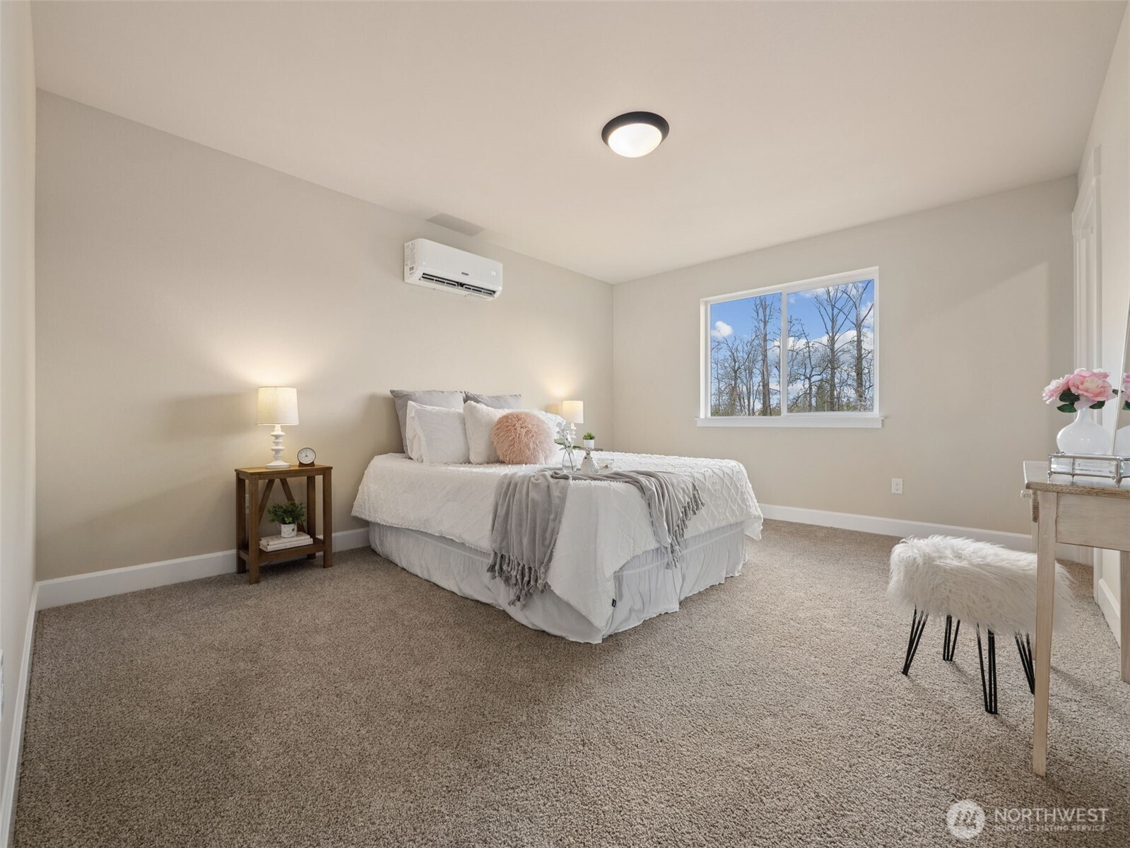 1742 Fieldcrest Place Buckley, WA 98321 - Photo 16 of 27 a bedroom with a bed and a couch