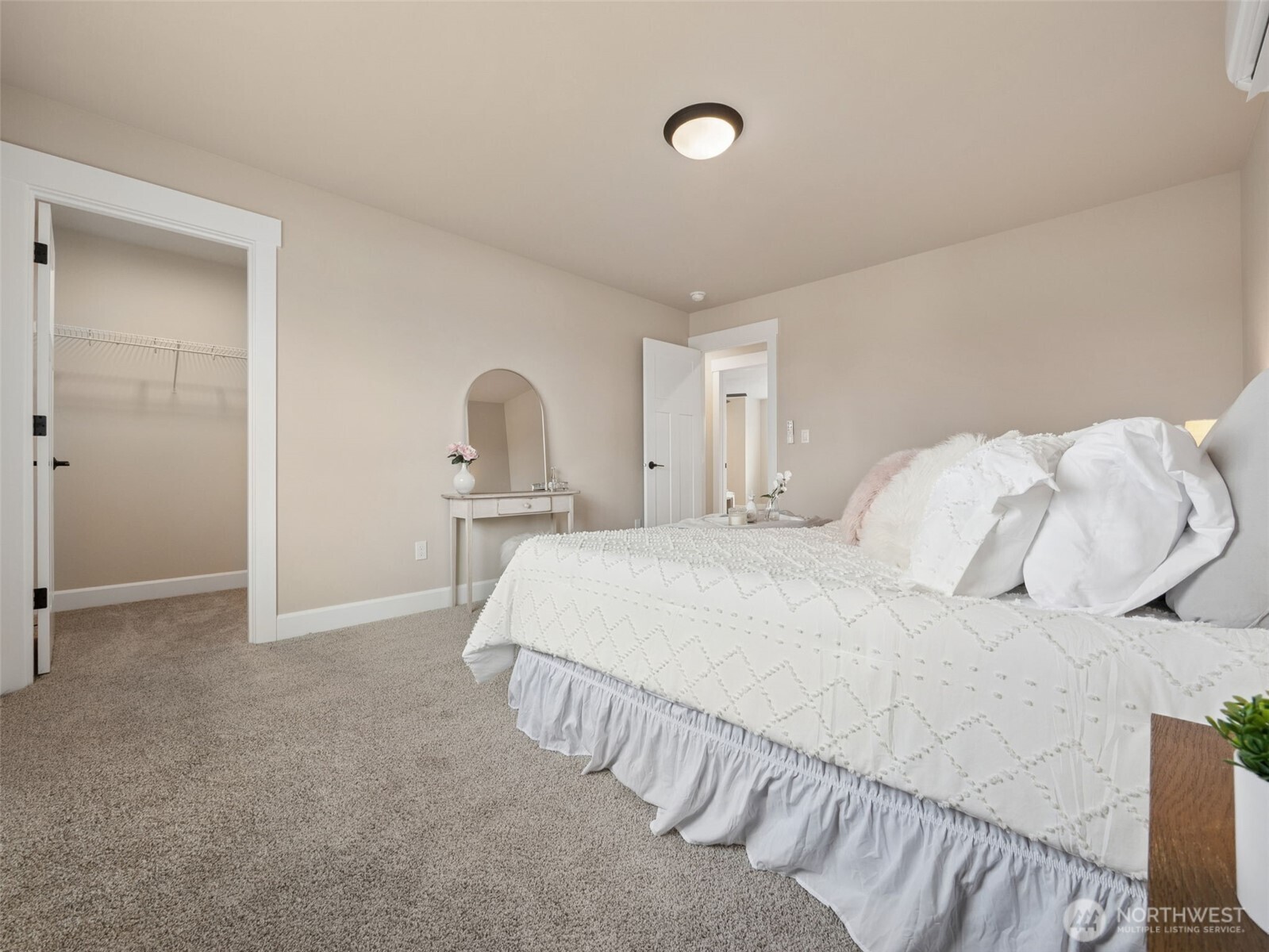 1742 Fieldcrest Place Buckley, WA 98321 - Photo 17 of 27 a bedroom with a bed and a large mirror
