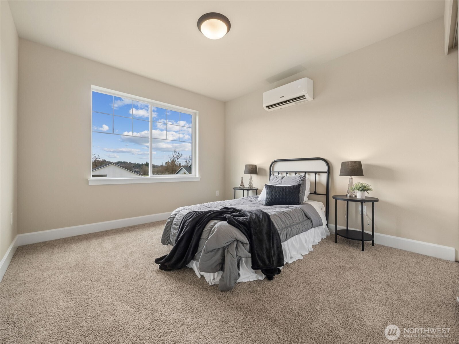 1742 Fieldcrest Place Buckley, WA 98321 - Photo 19 of 27 a bedroom with a bed and window