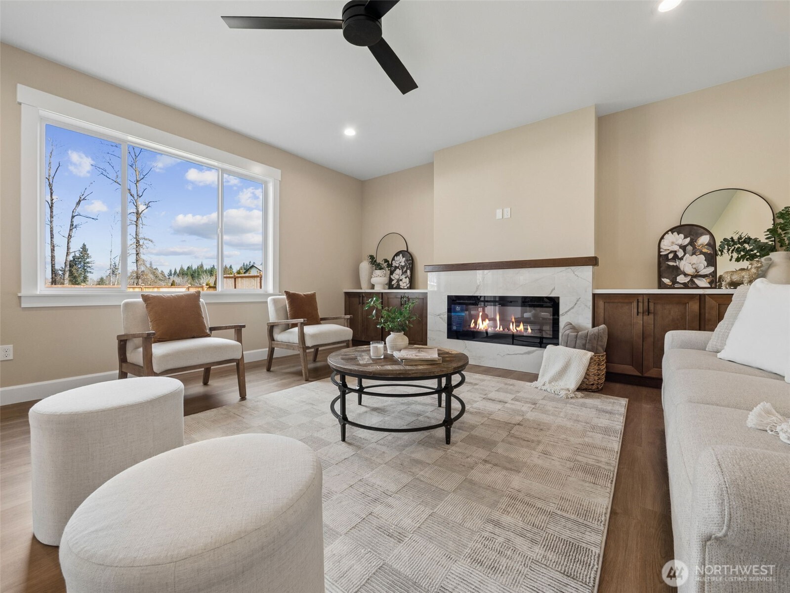 1742 Fieldcrest Place Buckley, WA 98321 - Photo 5 of 27 a living room with furniture and a fireplace