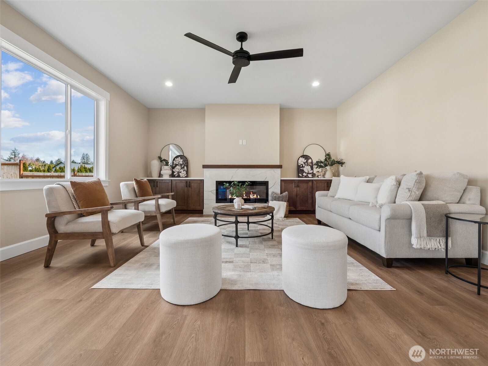 1742 Fieldcrest Place Buckley, WA 98321 - Photo 10 of 27 a living room with fireplace furniture and a wooden floor