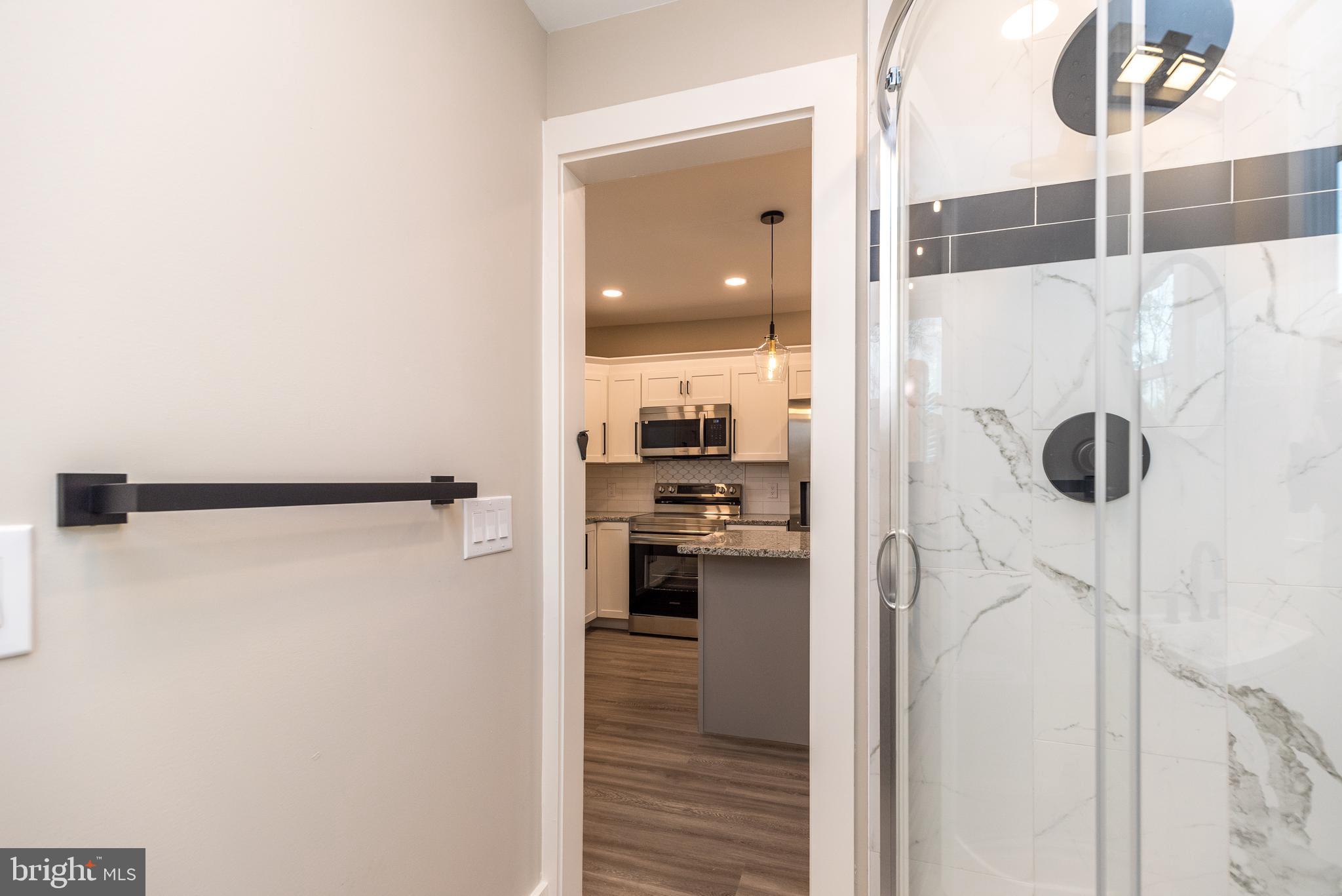 343 Pawlings Road Phoenixville, PA 19460 - Photo 18 of 50 a view of a kitchen from a hallway