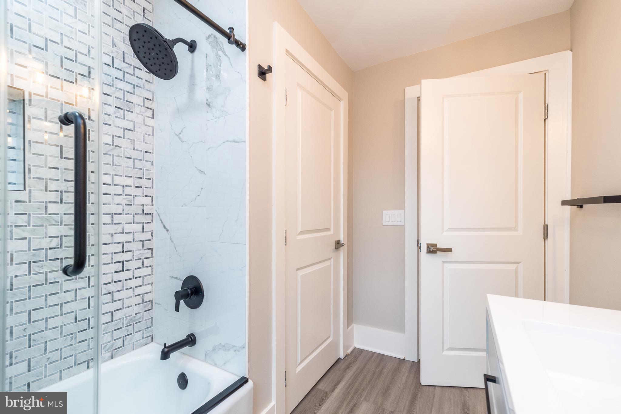 343 Pawlings Road Phoenixville, PA 19460 - Photo 25 of 50 a bathroom with a bathtub and shower