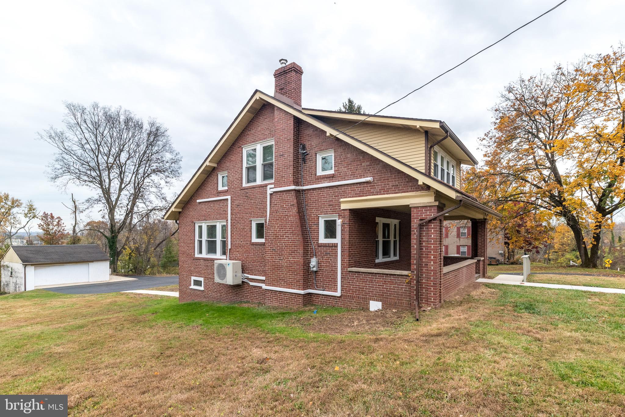 343 Pawlings Road Phoenixville, PA 19460 - Photo 41 of 50 a view of a house with a yard