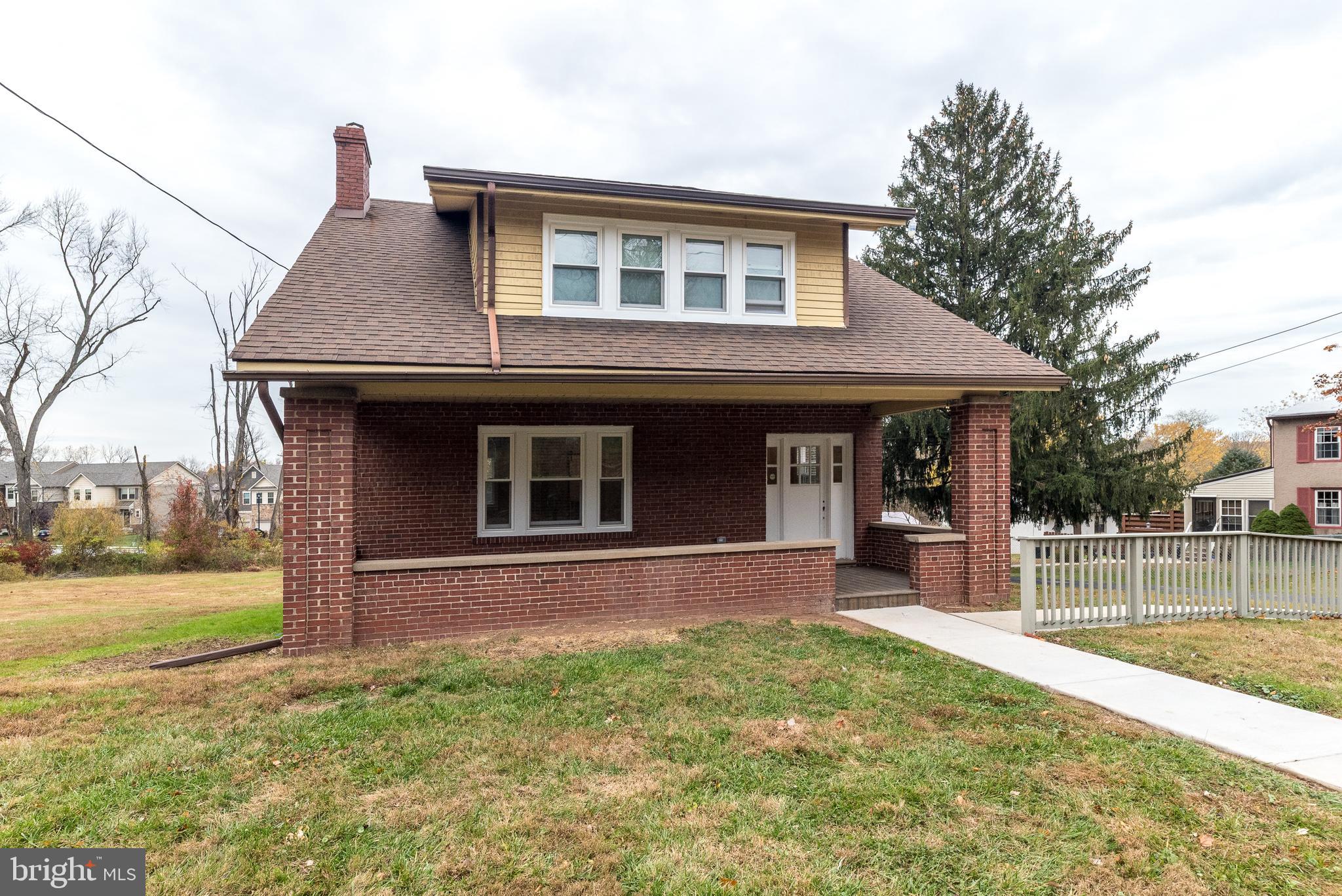 343 Pawlings Road Phoenixville, PA 19460 - Photo 42 of 50 a front view of a house with a yard