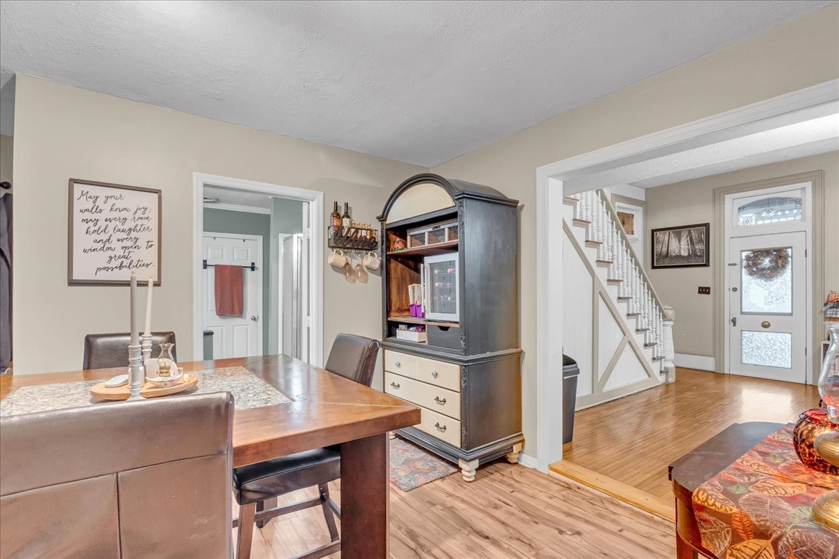 412 East Harp Street Manchester, TN 37355 - Photo 14 of 79 a room with furniture and a wooden floor