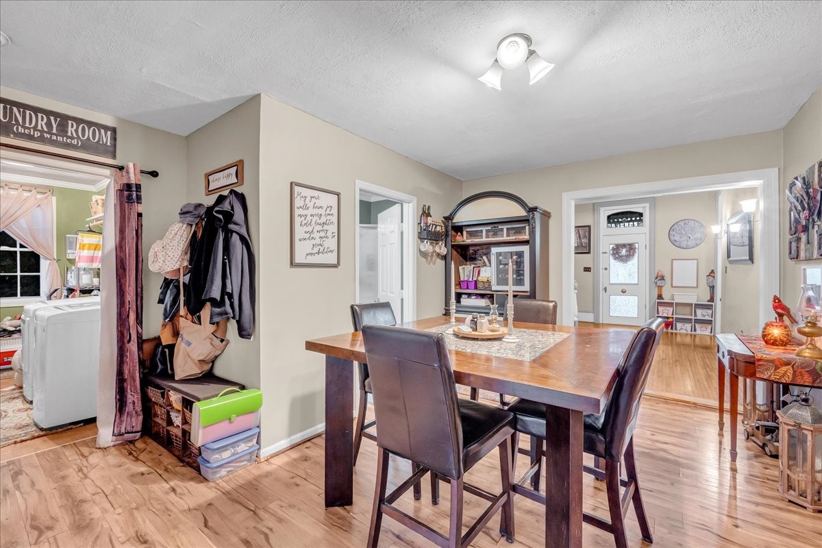 412 East Harp Street Manchester, TN 37355 - Photo 16 of 79 a view of a dining room with furniture and wooden floor