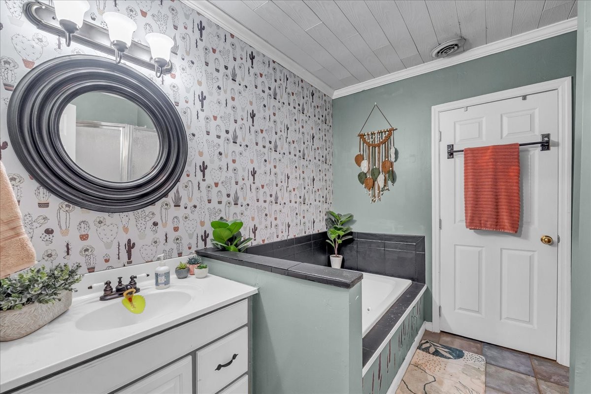 412 East Harp Street Manchester, TN 37355 - Photo 18 of 79 a bathroom with a sink and a mirror