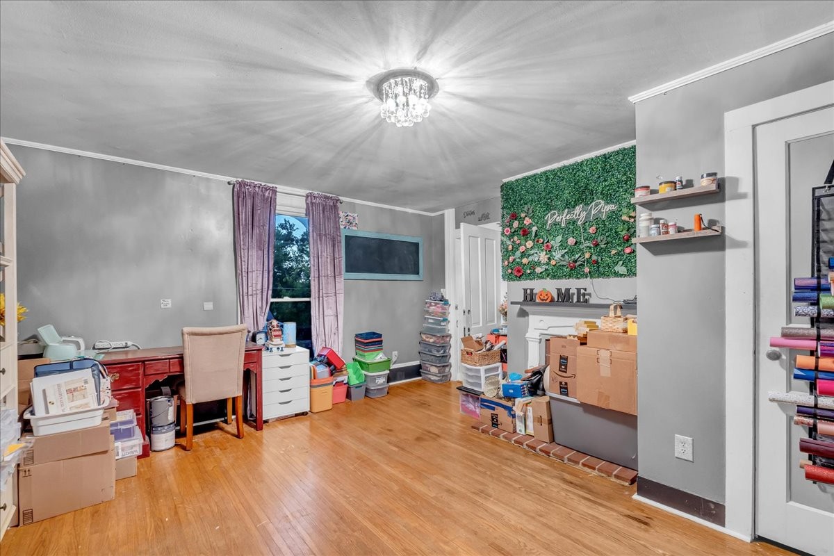 412 East Harp Street Manchester, TN 37355 - Photo 36 of 79 a living room with furniture and a flat screen tv