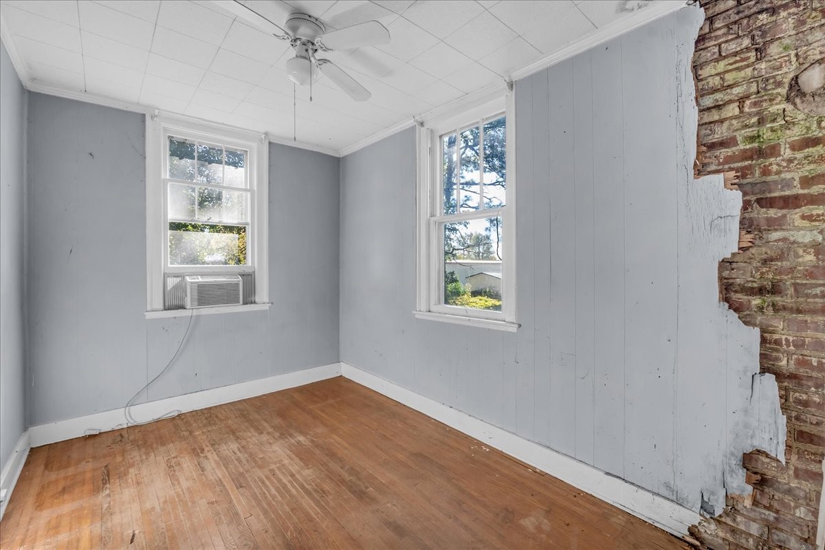 412 East Harp Street Manchester, TN 37355 - Photo 66 of 79 a view of an empty room with a window and wooden floor