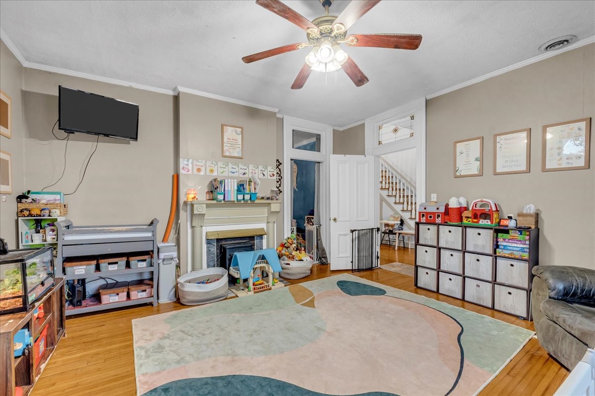 412 East Harp Street Manchester, TN 37355 - Photo 7 of 79 a bed room with furniture and a fireplace