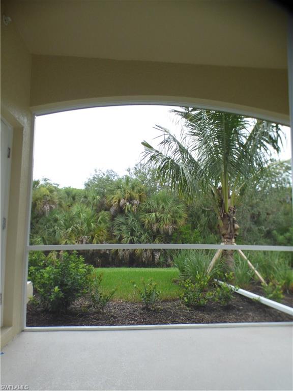 18244 Creekside Preserve Loop, Unit 102 Fort Myers, FL 33908 - Photo 13 of 23 a view of a yard with a from a balcony