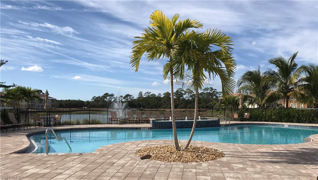 18244 Creekside Preserve Loop, Unit 102 Fort Myers, FL 33908 - Photo 15 of 23 a view of outdoor space with swimming pool