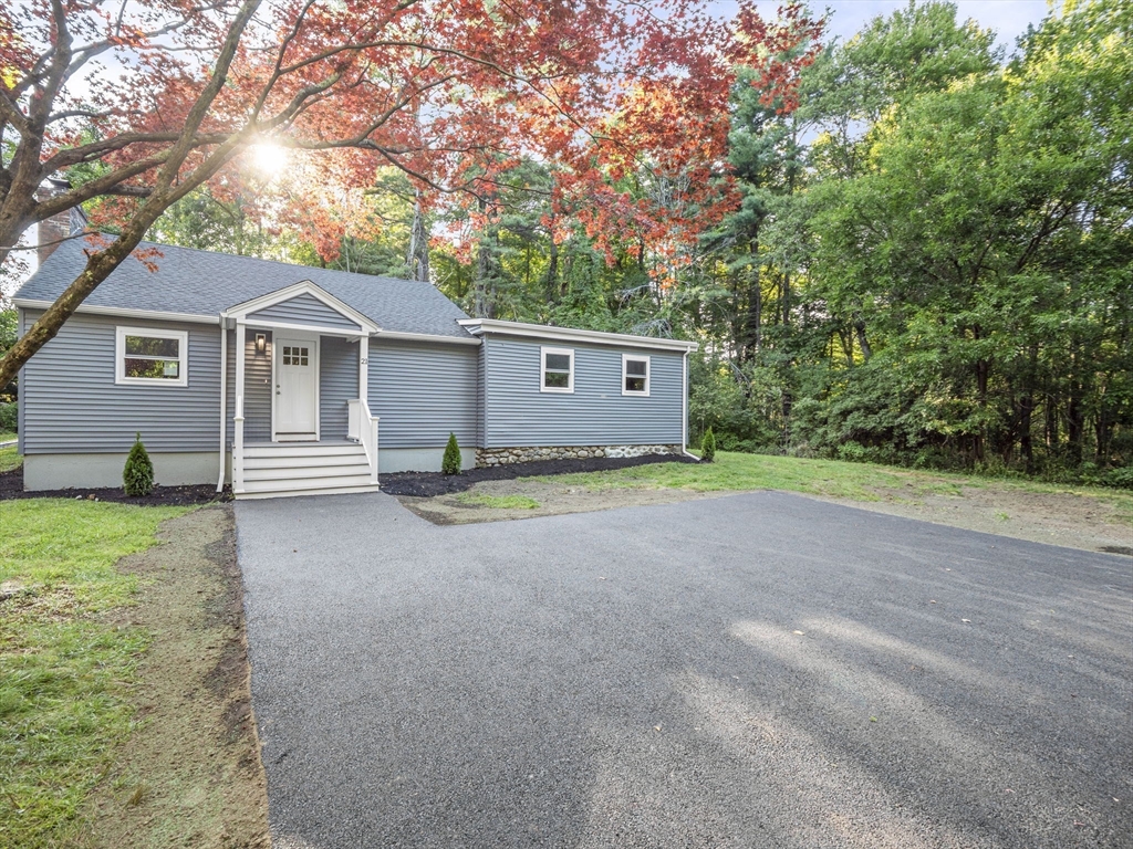 a house with trees in front of it
