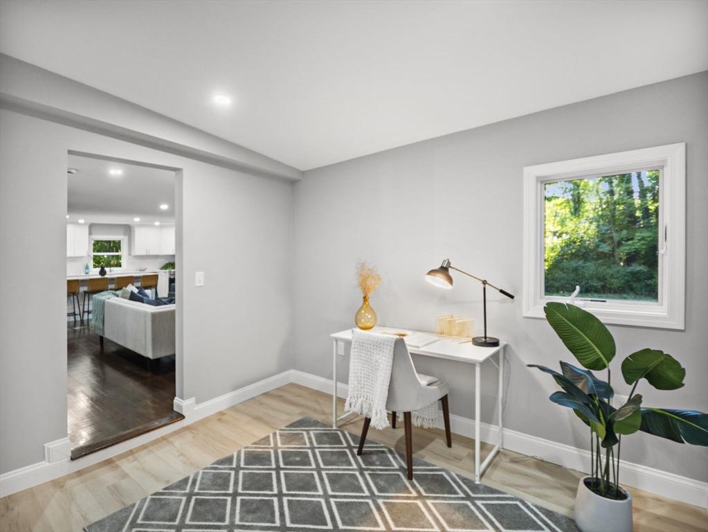 21 Webster Street Andover, MA 01810 - Photo 15 of 24 a living room with furniture and a large window