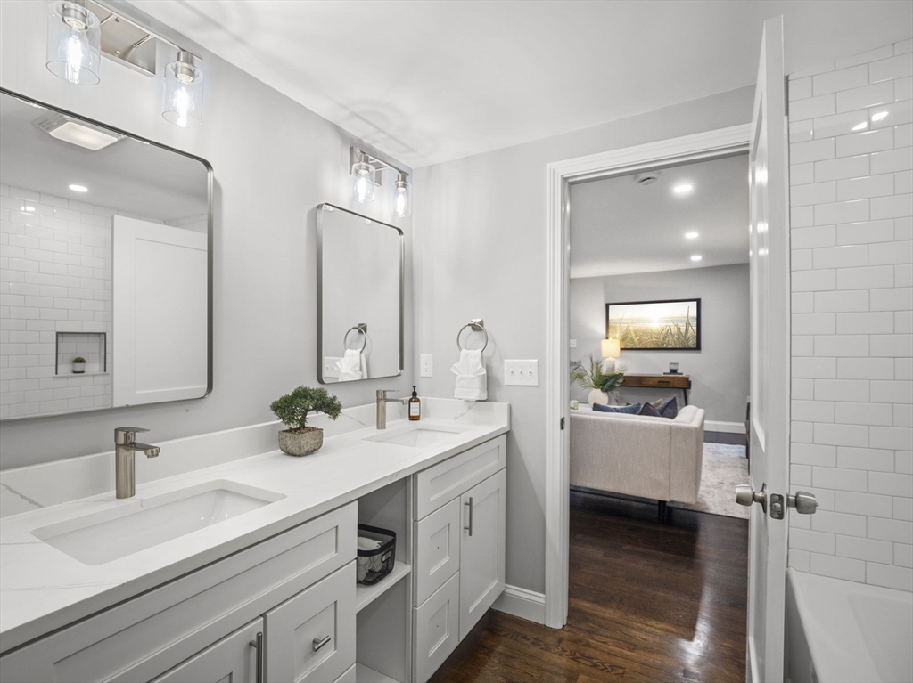 21 Webster Street Andover, MA 01810 - Photo 16 of 24 a spacious bathroom with a double vanity sink double and mirror