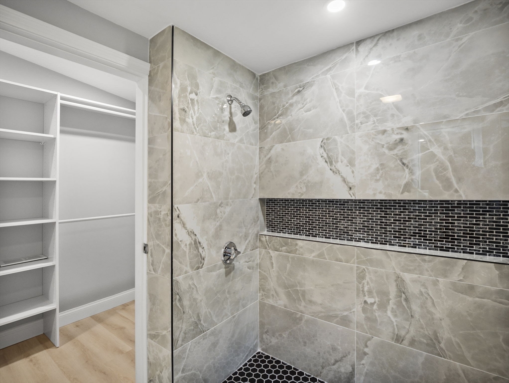21 Webster Street Andover, MA 01810 - Photo 17 of 24 a bathroom with a shower