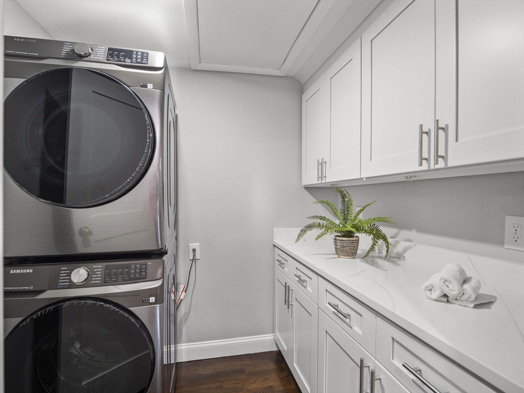 21 Webster Street Andover, MA 01810 - Photo 18 of 24 a utility room with sink dryer and washer