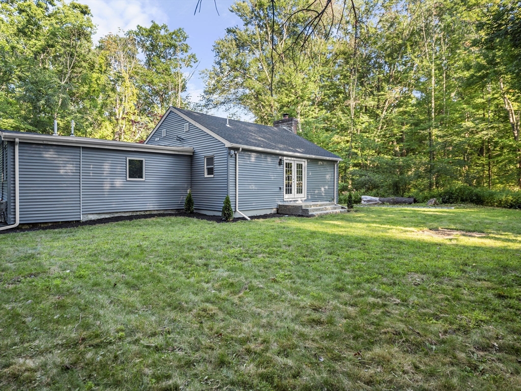 21 Webster Street Andover, MA 01810 - Photo 21 of 24 a house view with a garden space