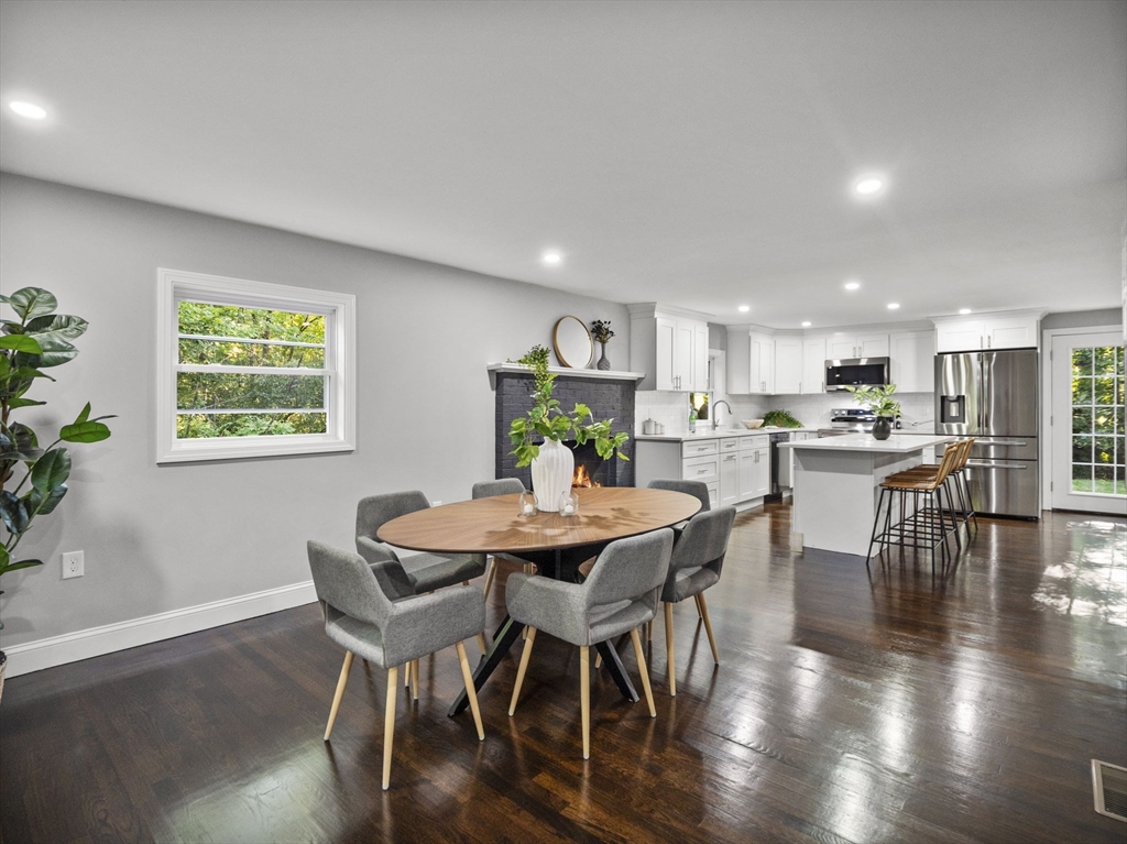 21 Webster Street Andover, MA 01810 - Photo 8 of 24 a view of a dining room with furniture window and wooden floor
