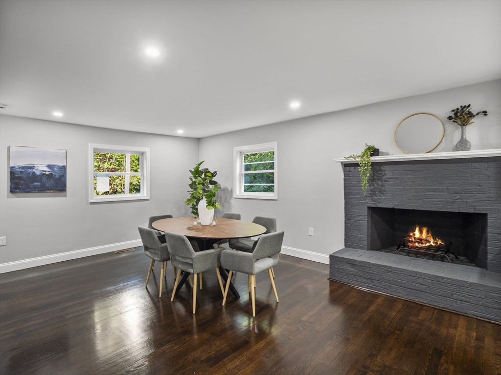 21 Webster Street Andover, MA 01810 - Photo 9 of 24 a view of a dining room with furniture window and wooden floor