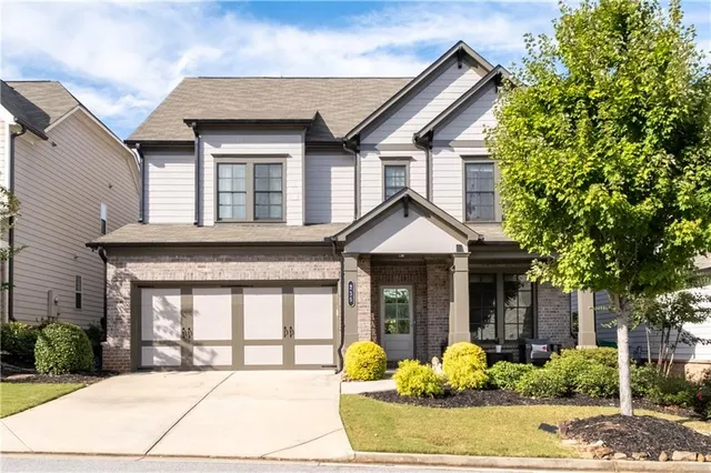 front view of a house with a yard