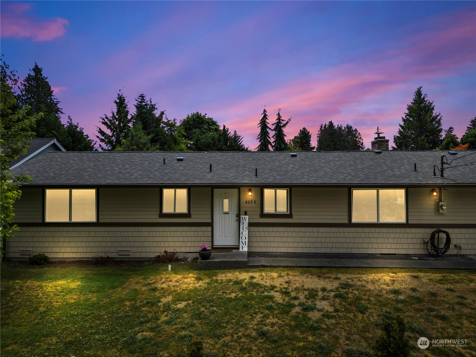 423 Rhodora Heights Road, Unit B Lake Stevens, WA 98258 - Photo 40 of 40 a front view of a house with a yard