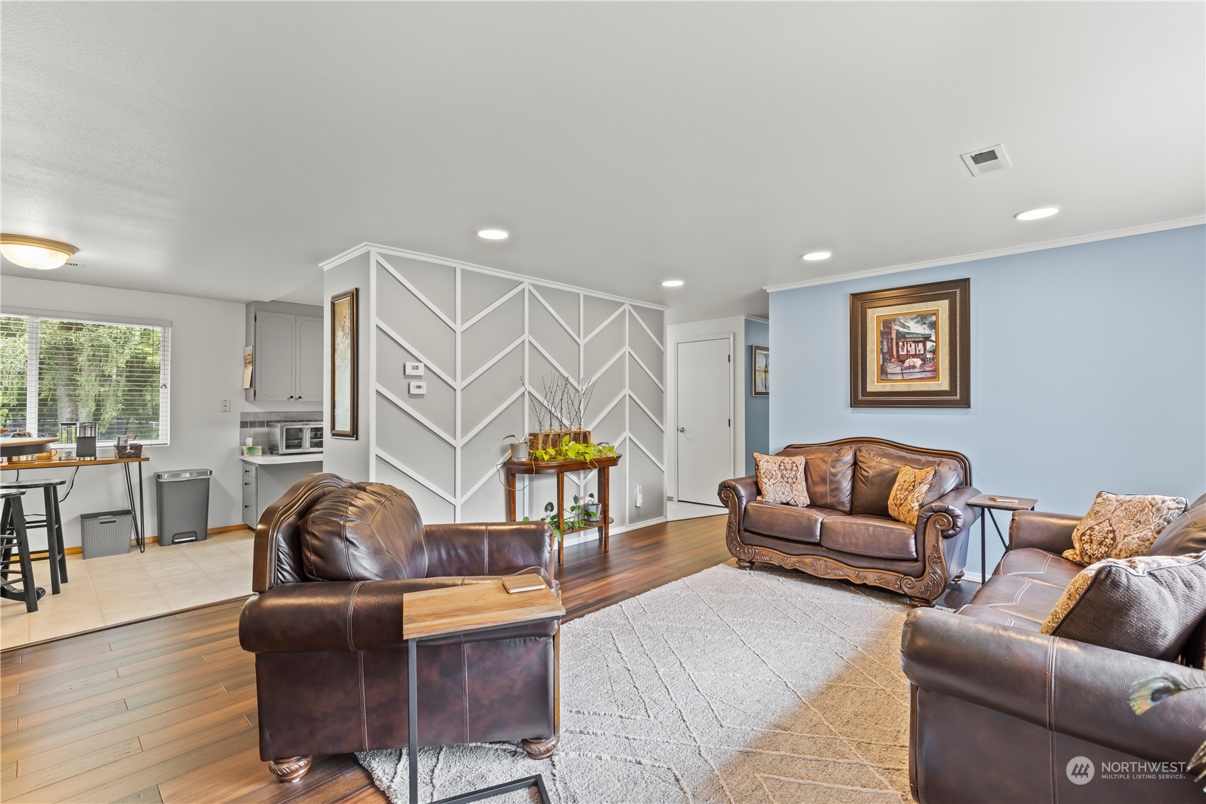 423 Rhodora Heights Road, Unit B Lake Stevens, WA 98258 - Photo 8 of 40 a living room with furniture a couch and wooden floor