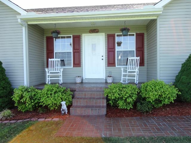 1206 Chapmansboro Road Chapmansboro, TN 37035 - Photo 8 of 12 Front porch with custom finish.