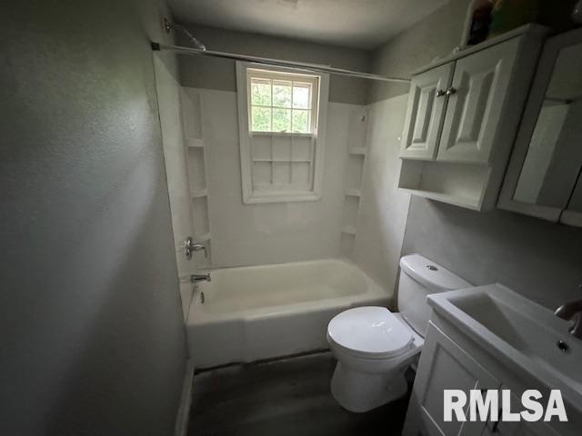 6812 33rd Street Moline, IL 61265 - Photo 7 of 17 a bathroom with a toilet and a shower
