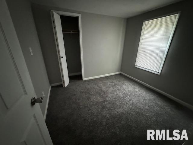 6812 33rd Street Moline, IL 61265 - Photo 8 of 17 an empty room with a window