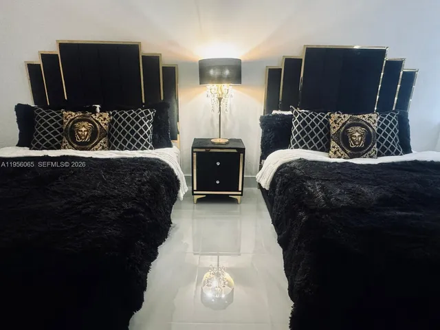 a living room with a couch and a flat screen tv