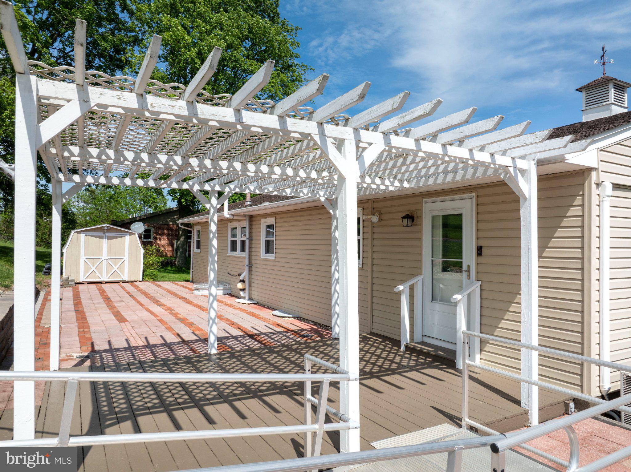 1639 Houserville Road State College, PA 16801 - Photo 45 of 54 Charming patio with a sunlit pergola.