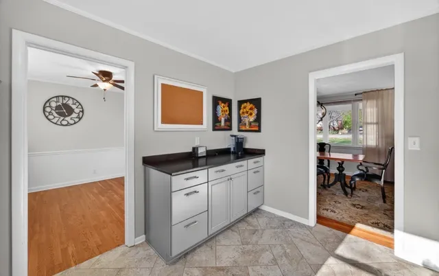 a living room with furniture and a rug
