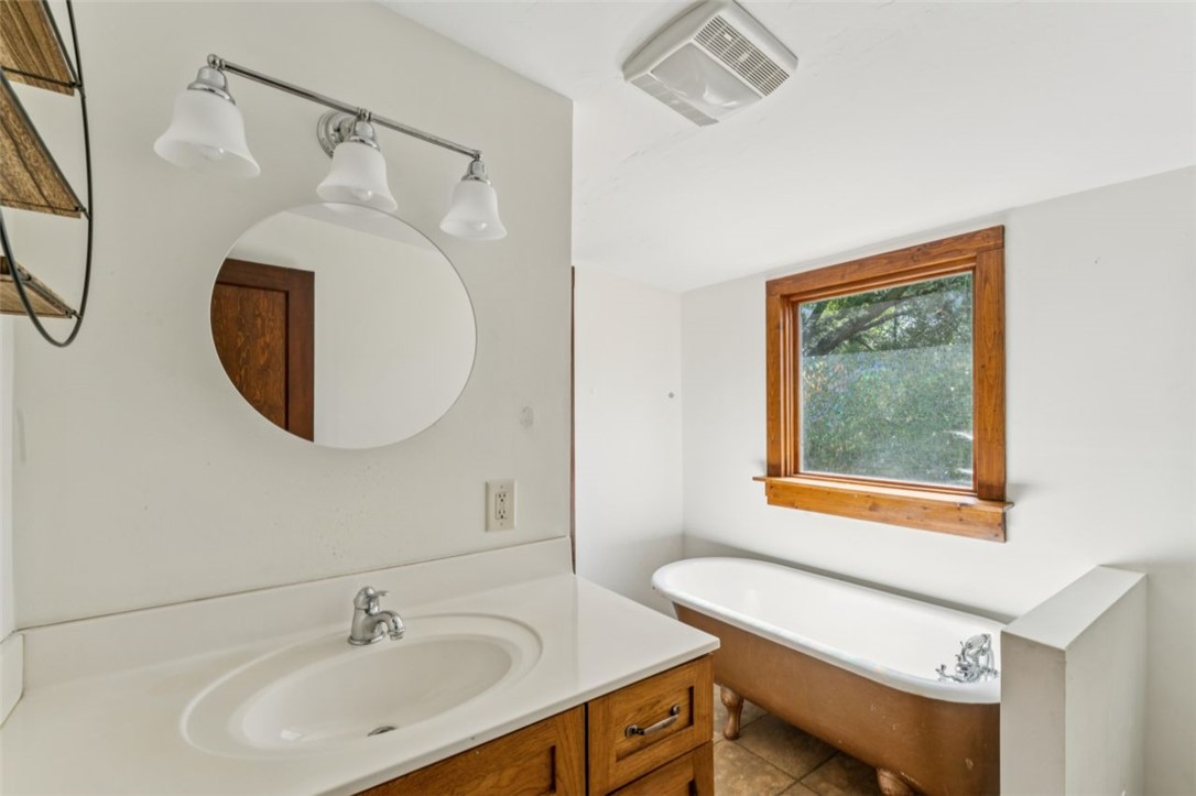 321 South Pine Street Walhalla, SC 29691 - Photo 26 of 32 An inviting bathroom with a classic clawfoot tub, perfect for unwinding after a long day.