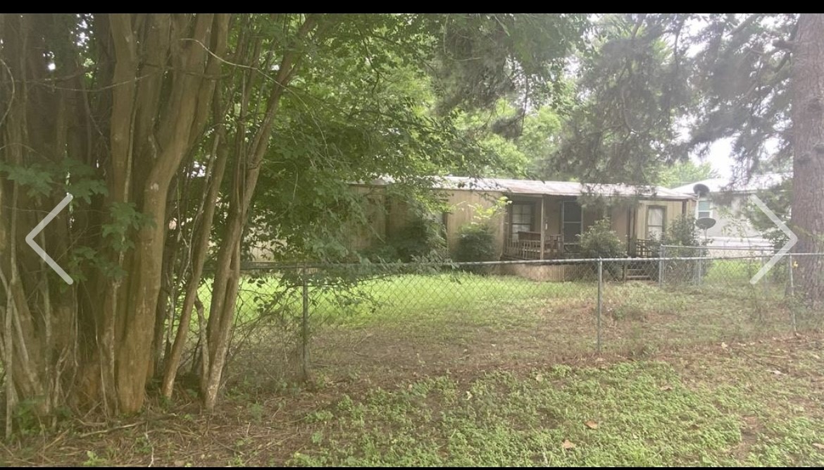 184 Mercury Trinity, TX 75862 - Photo 1 of 16 a view of a backyard of a house