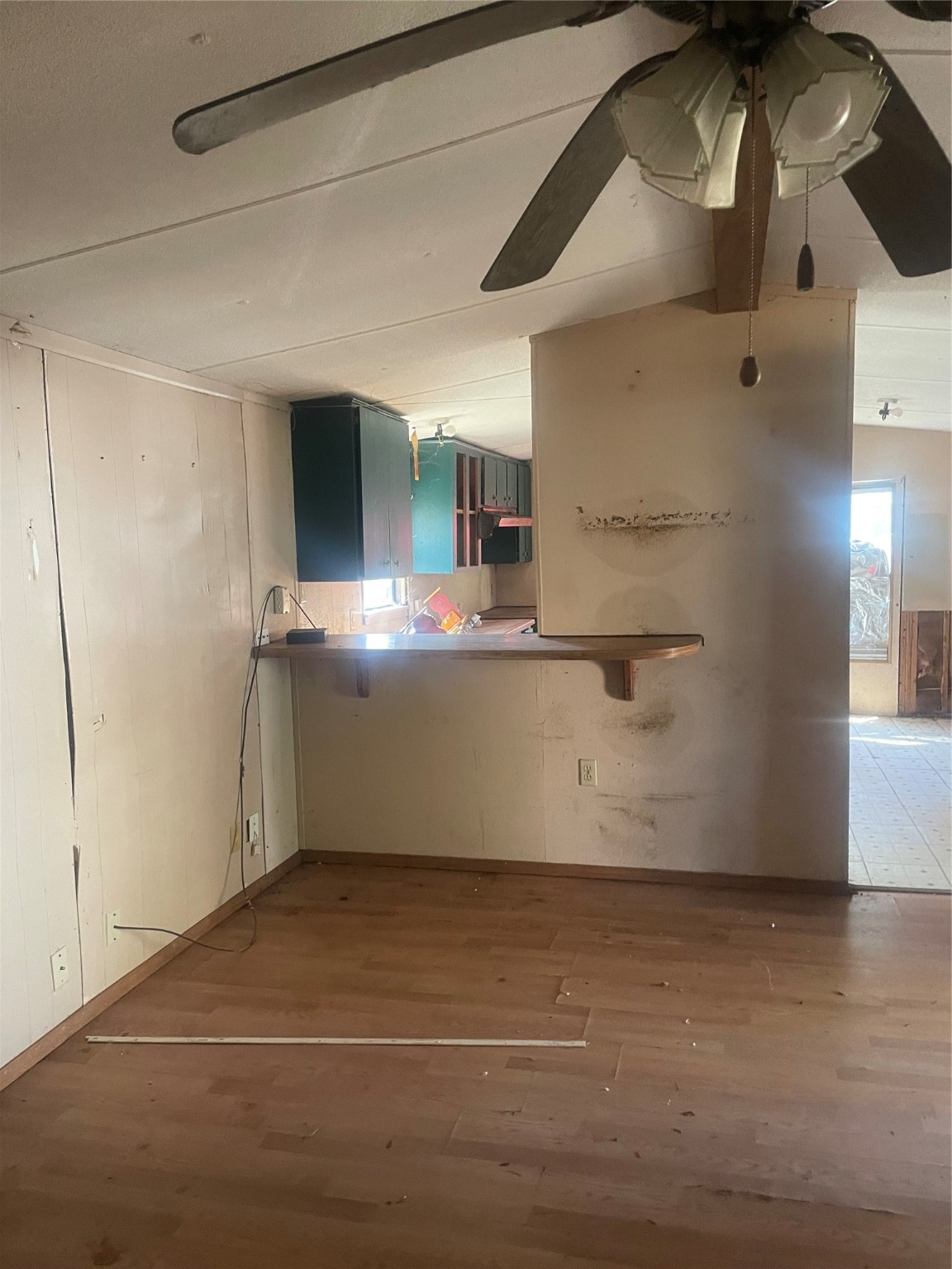 184 Mercury Trinity, TX 75862 - Photo 12 of 16 a room with a wooden floor and white wall