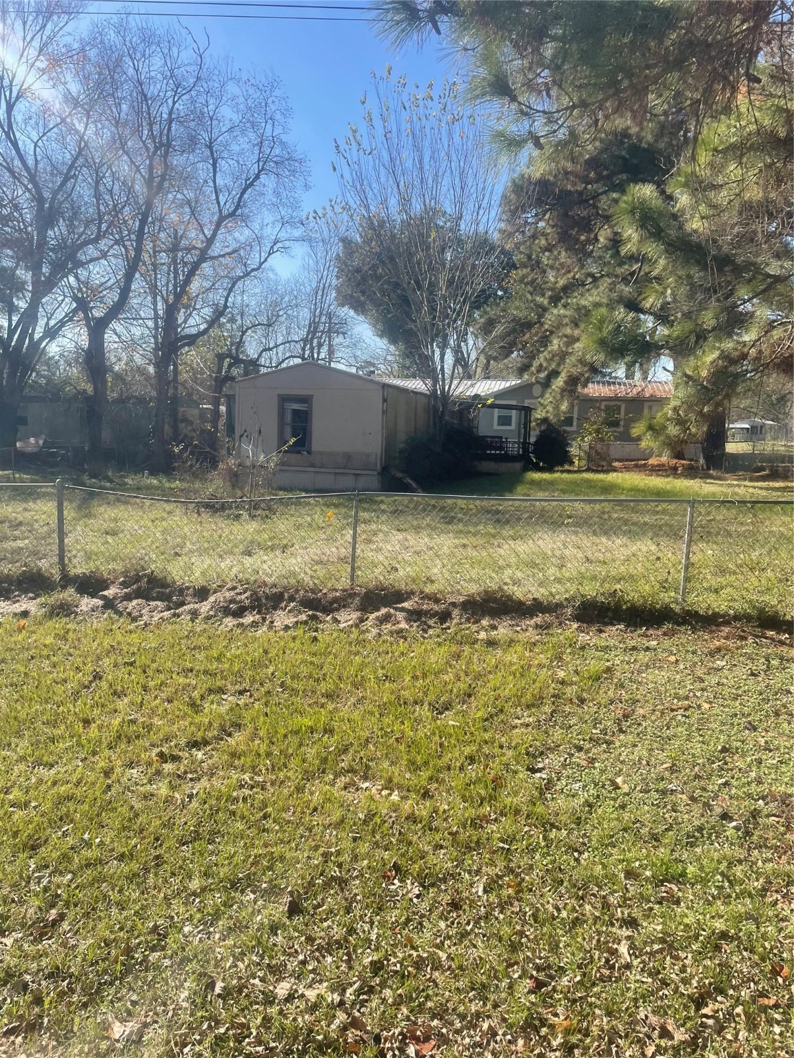 184 Mercury Trinity, TX 75862 - Photo 15 of 16 a view of a yard with a table and chair
