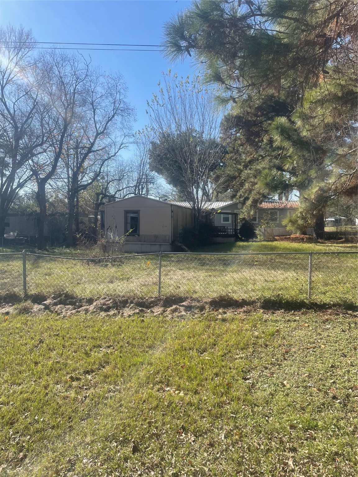 184 Mercury Trinity, TX 75862 - Photo 16 of 16 a view of a lake with a yard